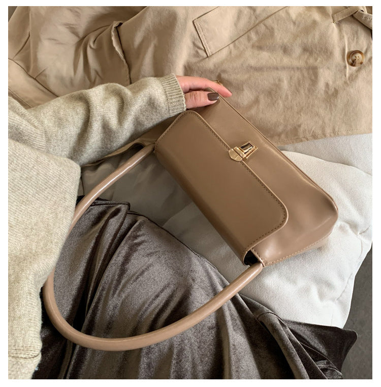 Textured French Style Women's New Fashion Retro2025Large Capacity Casual Solid Color Lock Buckle Handheld Baguette Underarm Bag for Women