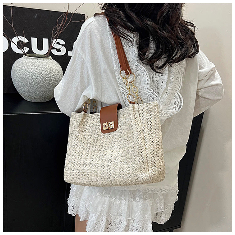 2025Women's Spring New Small Chanel Style Bag for Work Commute Versatile Straw Woven Large Capacity Wide Shoulder Strap Women's Single Shoulder Bag