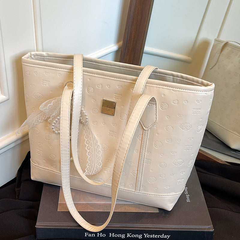 European and American Trendy Simple Large Capacity Tote Bag2025New high-value casual cute embossed single-shoulder handbag