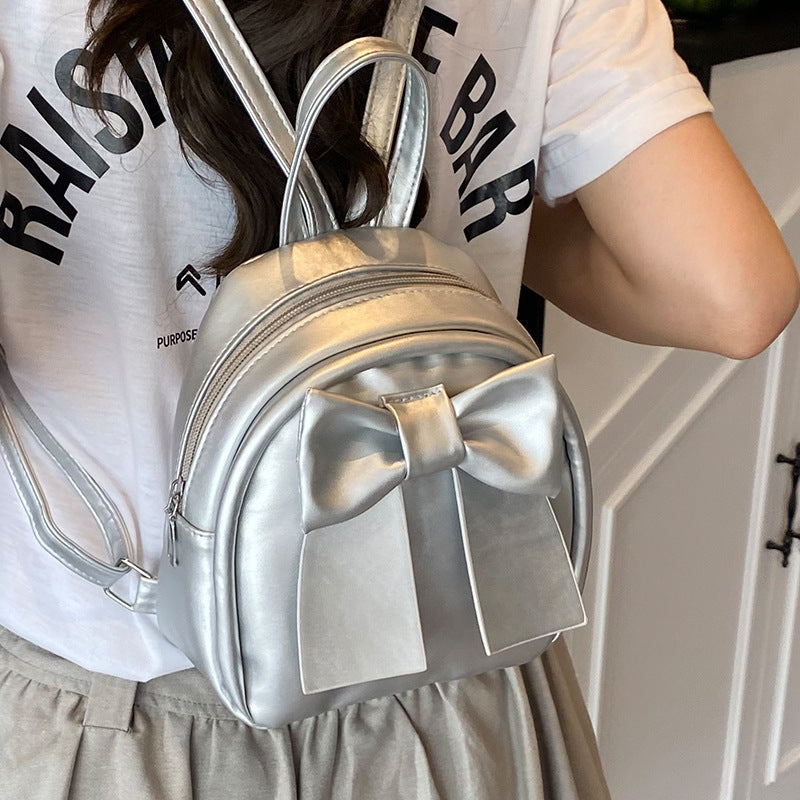 2025Summer New Niche Bow Backpack for Women, Stylish and Simple Handheld, Single Shoulder, Crossbody, and Double Shoulder Backpack