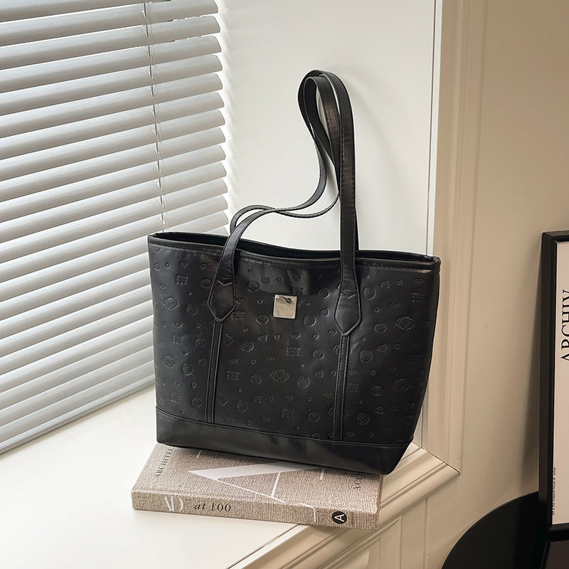 European and American Trendy Simple Large Capacity Tote Bag2025New high-value casual cute embossed single-shoulder handbag