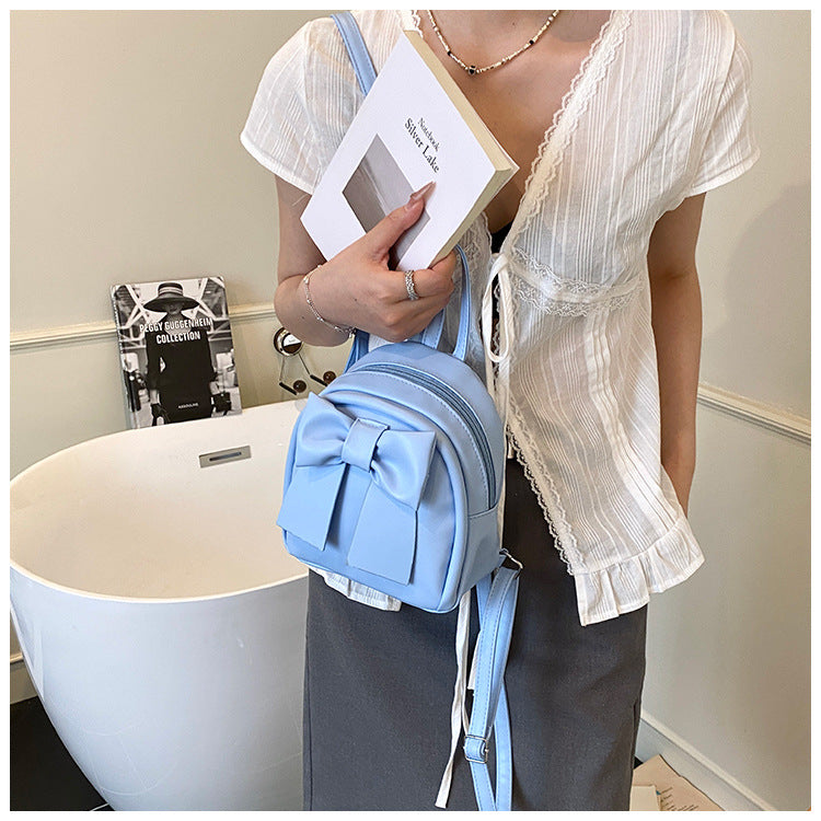 2025Summer New Niche Bow Backpack for Women, Stylish and Simple Handheld, Single Shoulder, Crossbody, and Double Shoulder Backpack