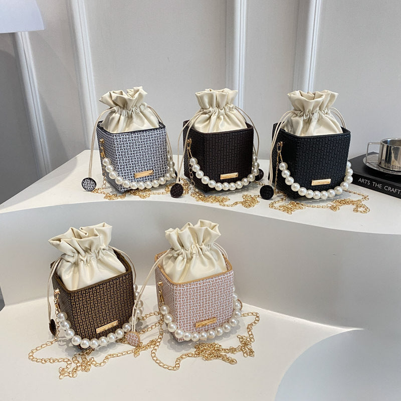 外贸潮流时尚唯美洋气个性珍珠抽绳包包女2025新款手提链条斜挎包