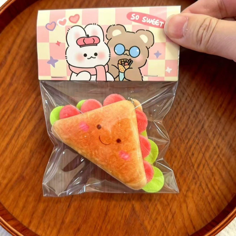 卡通毛绒挂件可爱碱水面包小玩偶包包挂饰钥匙扣服饰配件胸针配饰
