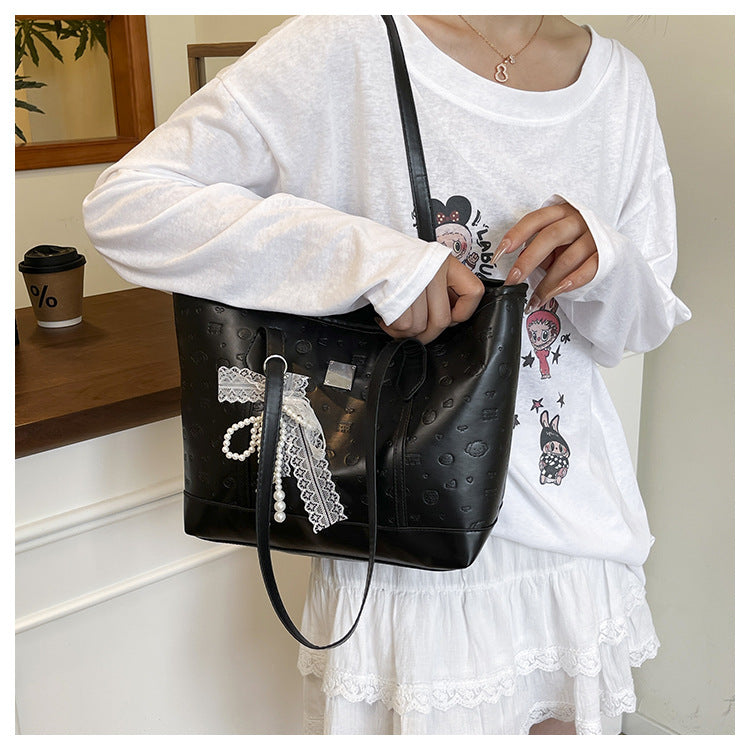 European and American Trendy Simple Large Capacity Tote Bag2025New high-value casual cute embossed single-shoulder handbag