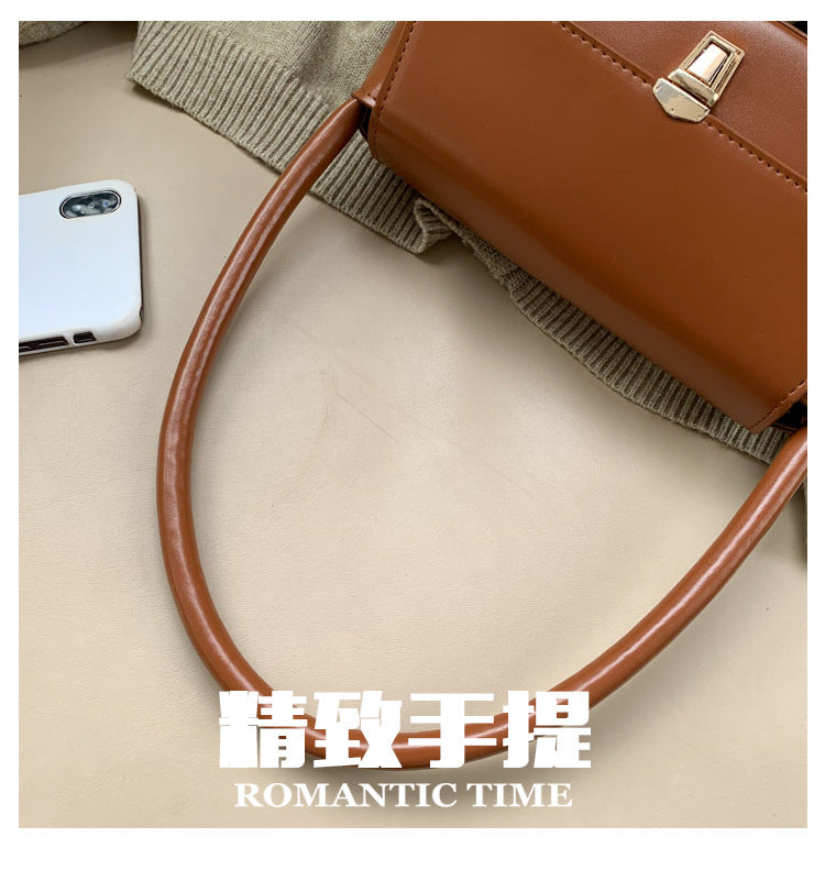 Textured French Style Women's New Fashion Retro2025Large Capacity Casual Solid Color Lock Buckle Handheld Baguette Underarm Bag for Women