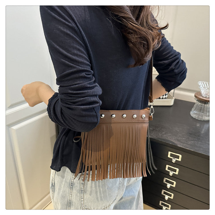 French retro tassel commuter bucket bag for women2025Summer new cross-border style soft shoulder crossbody tassel bag