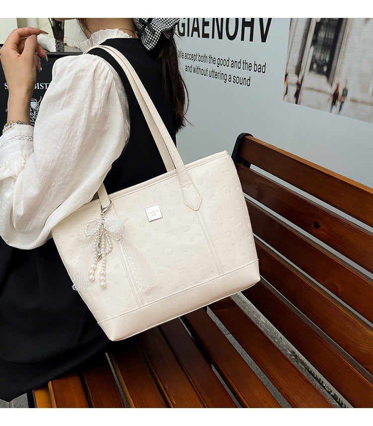 European and American Trendy Simple Large Capacity Tote Bag2025New high-value casual cute embossed single-shoulder handbag