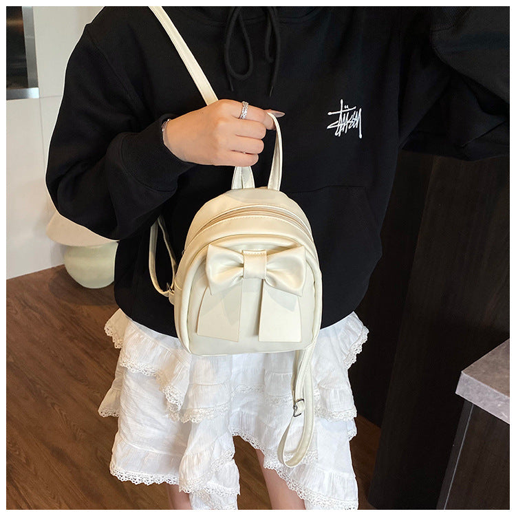 2025Summer New Niche Bow Backpack for Women, Stylish and Simple Handheld, Single Shoulder, Crossbody, and Double Shoulder Backpack