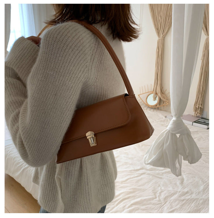 Textured French Style Women's New Fashion Retro2025Large Capacity Casual Solid Color Lock Buckle Handheld Baguette Underarm Bag for Women