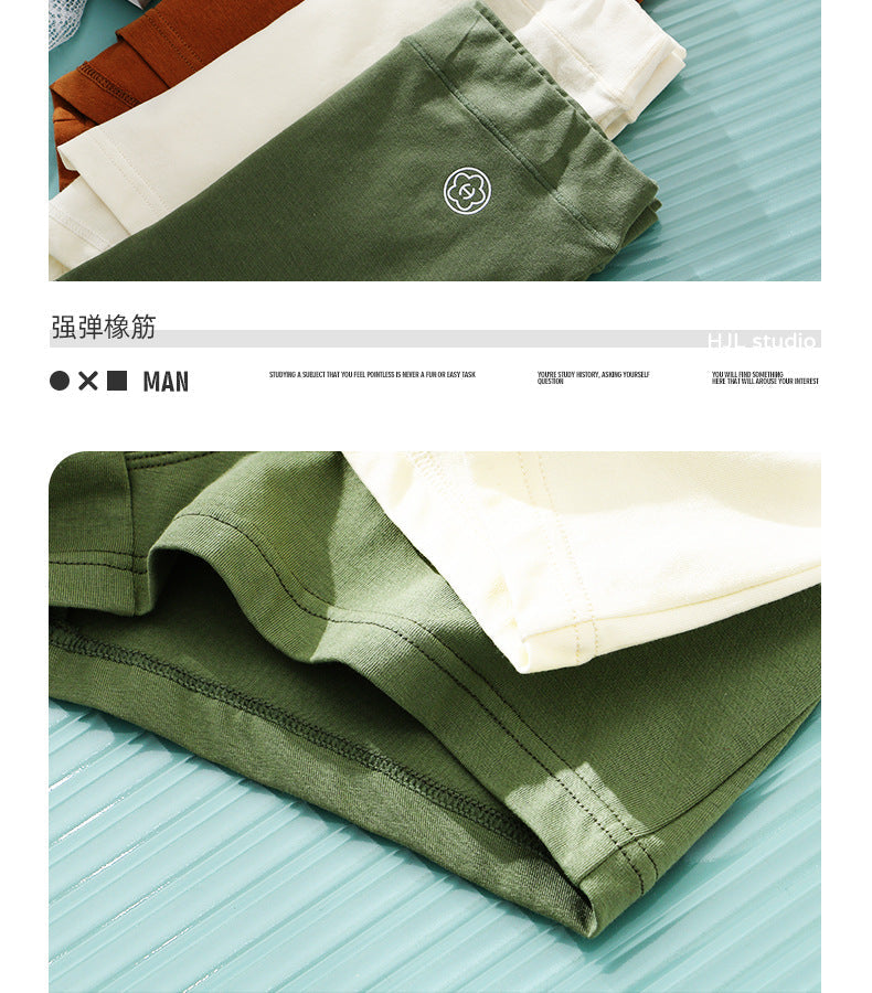Huajie Long Solid Color Cotton Underwear Men's Underwear Slim Fit Boxer Briefs Simple Breathable Men's Comfortable Boxer Briefs Wholesale http://detail.1688.com/offer/783105309256.html
