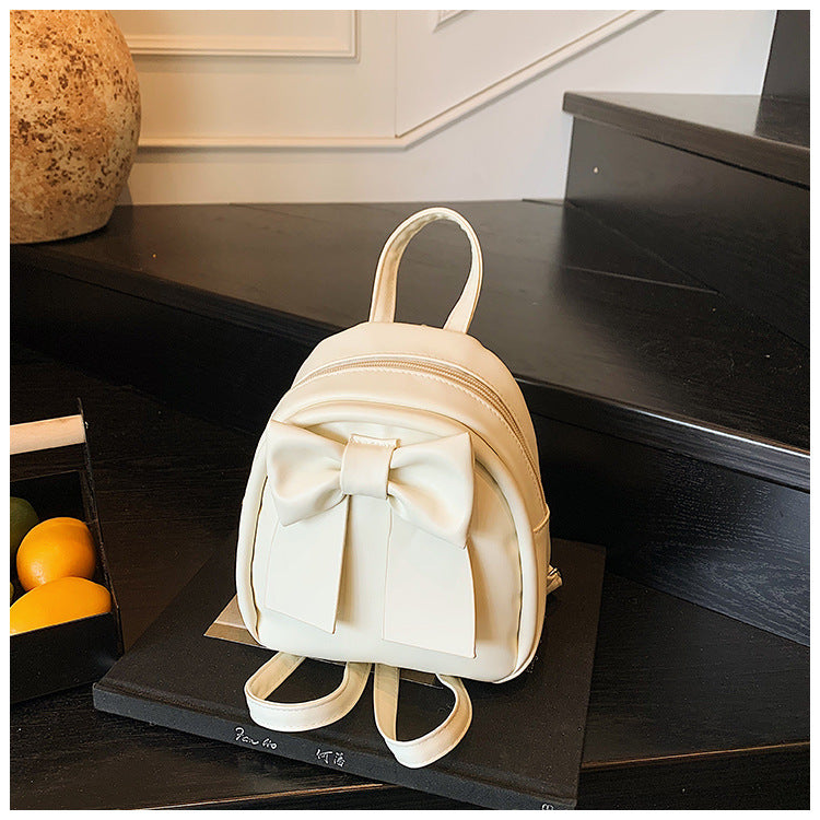 2025Summer New Niche Bow Backpack for Women, Stylish and Simple Handheld, Single Shoulder, Crossbody, and Double Shoulder Backpack