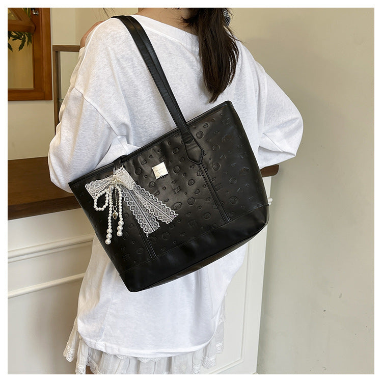 European and American Trendy Simple Large Capacity Tote Bag2025New high-value casual cute embossed single-shoulder handbag