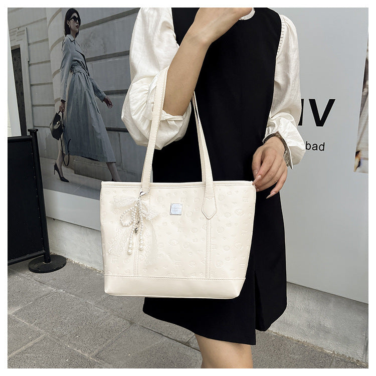 European and American Trendy Simple Large Capacity Tote Bag2025New high-value casual cute embossed single-shoulder handbag