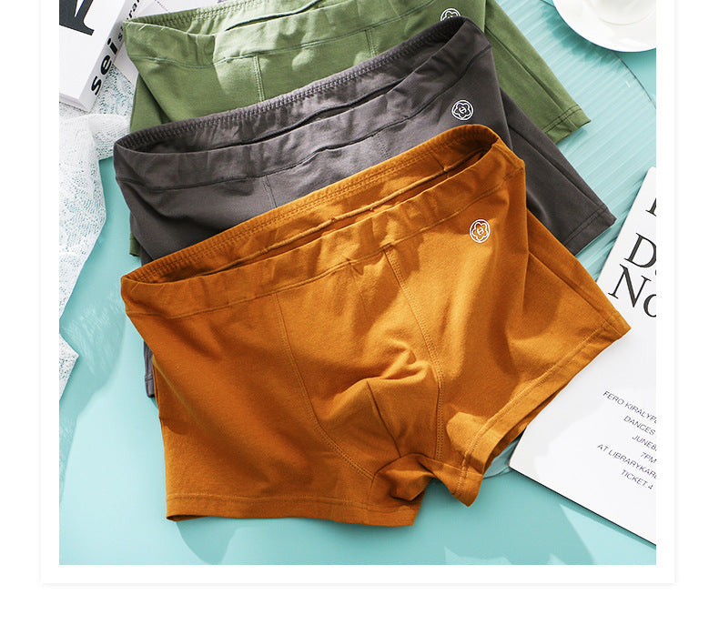 Huajie Long Solid Color Cotton Underwear Men's Underwear Slim Fit Boxer Briefs Simple Breathable Men's Comfortable Boxer Briefs Wholesale http://detail.1688.com/offer/783105309256.html