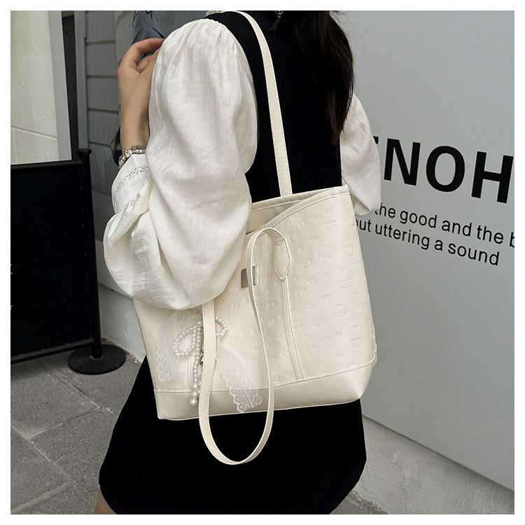 European and American Trendy Simple Large Capacity Tote Bag2025New high-value casual cute embossed single-shoulder handbag
