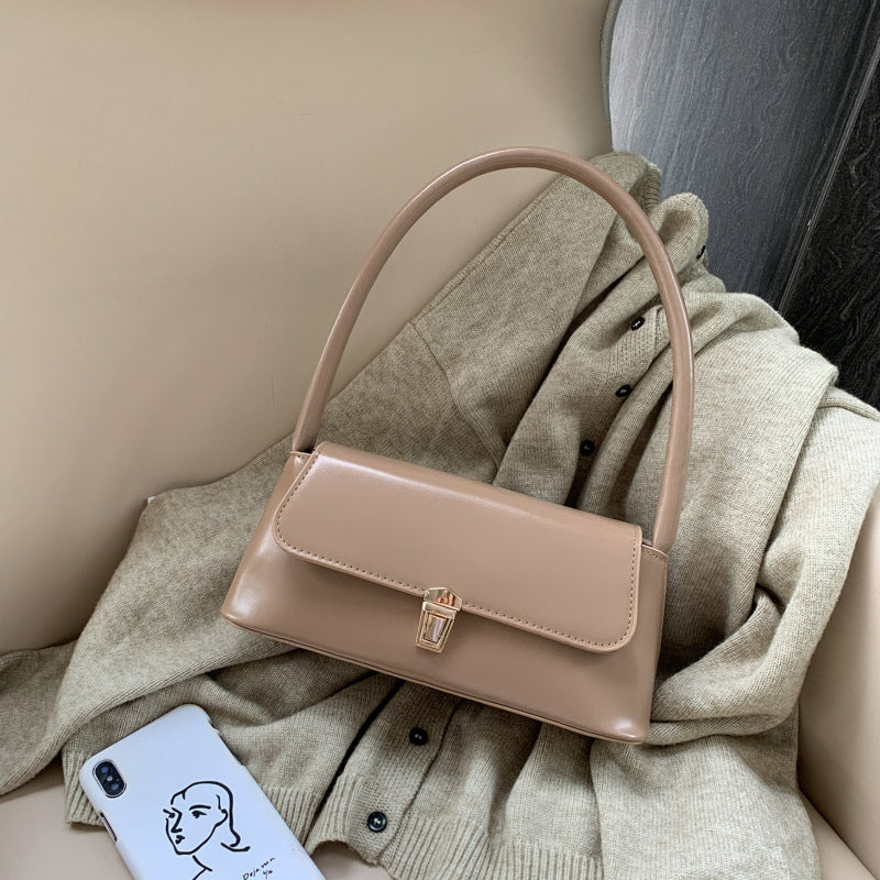 Textured French Style Women's New Fashion Retro2025Large Capacity Casual Solid Color Lock Buckle Handheld Baguette Underarm Bag for Women