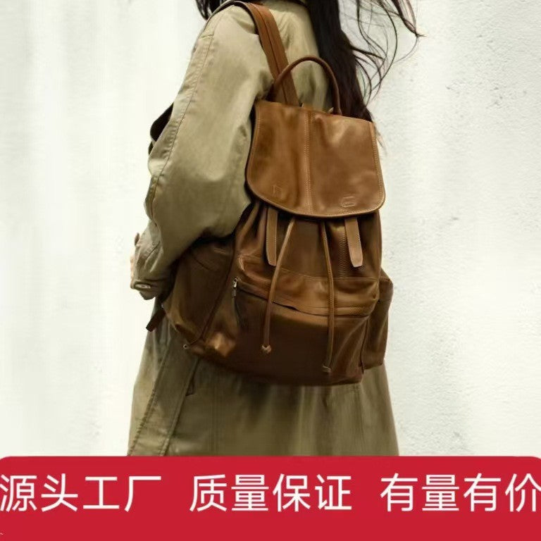 Qiu Zhen Vegetable-Tanned Sheepskin Self-Travel Backpack Travel Lightweight Casual Retro Genuine Leather Large Capacity Backpack Unisex http://detail.1688.com/offer/969513720056.html