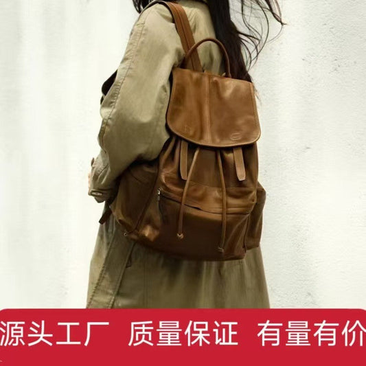 Qiu Zhen Vegetable-Tanned Sheepskin Self-Travel Backpack Travel Lightweight Casual Retro Genuine Leather Large Capacity Backpack Unisex http://detail.1688.com/offer/969513720056.html