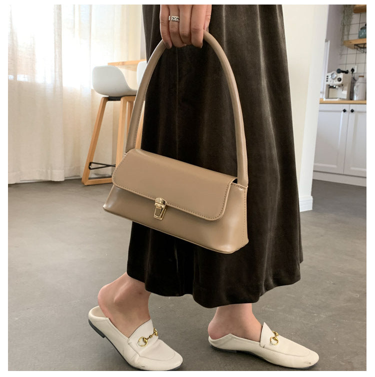 Textured French Style Women's New Fashion Retro2025Large Capacity Casual Solid Color Lock Buckle Handheld Baguette Underarm Bag for Women