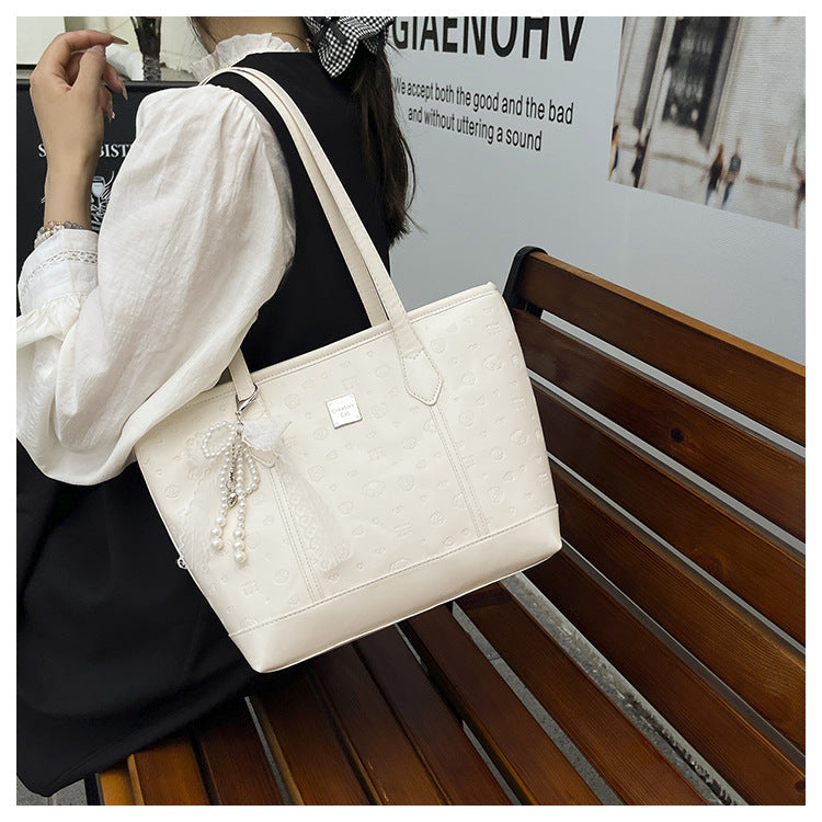 European and American Trendy Simple Large Capacity Tote Bag2025New high-value casual cute embossed single-shoulder handbag