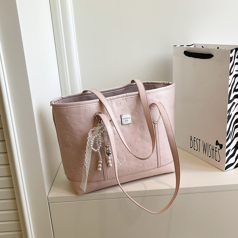 European and American Trendy Simple Large Capacity Tote Bag2025New high-value casual cute embossed single-shoulder handbag