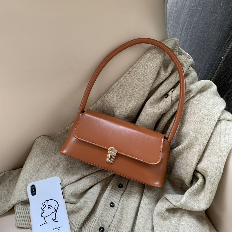 Textured French Style Women's New Fashion Retro2025Large Capacity Casual Solid Color Lock Buckle Handheld Baguette Underarm Bag for Women