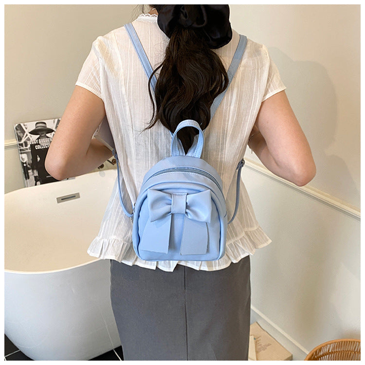 2025Summer New Niche Bow Backpack for Women, Stylish and Simple Handheld, Single Shoulder, Crossbody, and Double Shoulder Backpack
