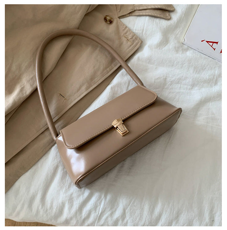 Textured French Style Women's New Fashion Retro2025Large Capacity Casual Solid Color Lock Buckle Handheld Baguette Underarm Bag for Women