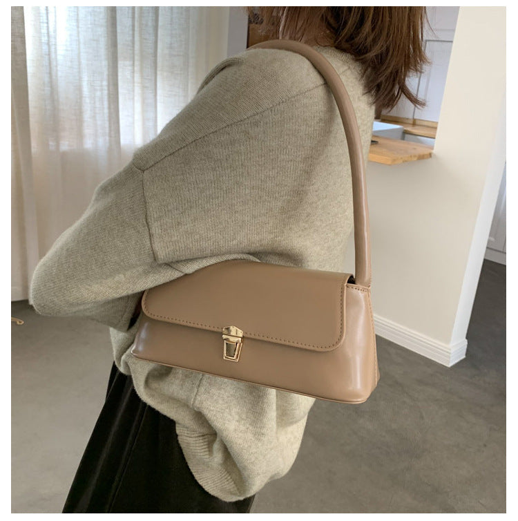 Textured French Style Women's New Fashion Retro2025Large Capacity Casual Solid Color Lock Buckle Handheld Baguette Underarm Bag for Women