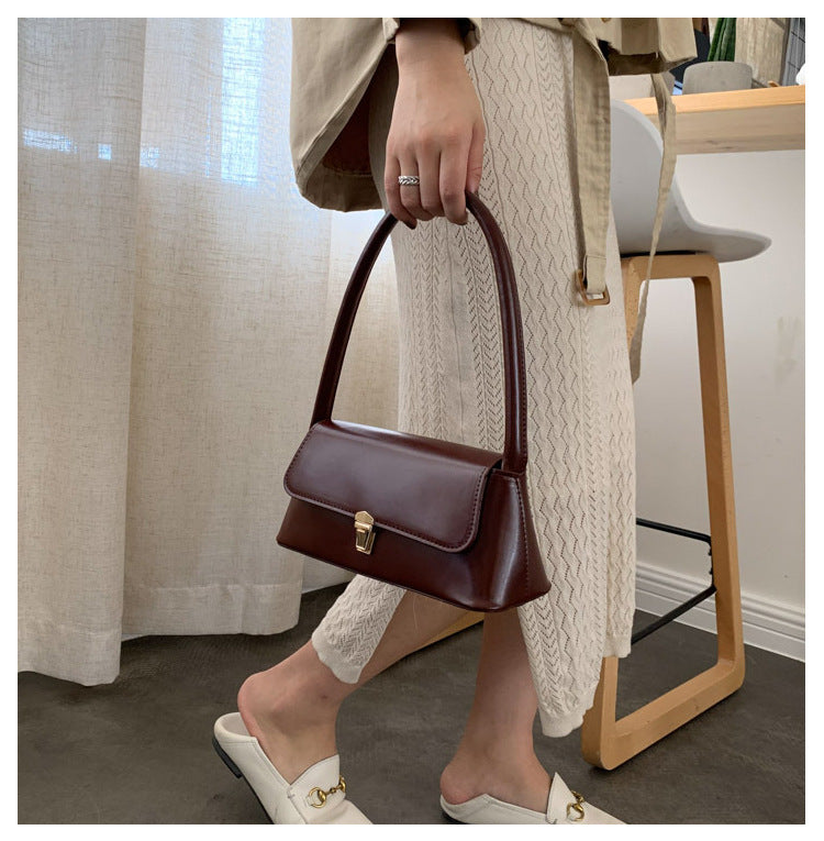 Textured French Style Women's New Fashion Retro2025Large Capacity Casual Solid Color Lock Buckle Handheld Baguette Underarm Bag for Women