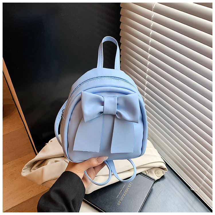 2025Summer New Niche Bow Backpack for Women, Stylish and Simple Handheld, Single Shoulder, Crossbody, and Double Shoulder Backpack